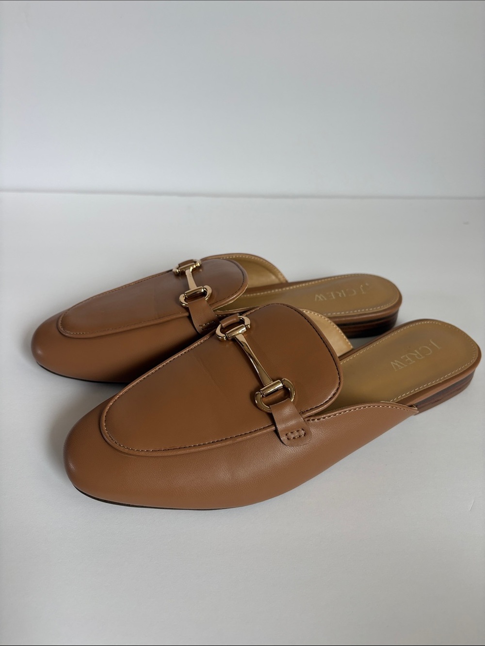J. Crew tan leather loafer mule with classic gold toned horsebit detail
